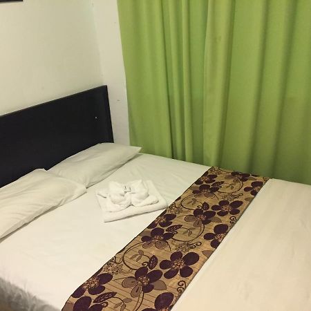 مُوار Hotel Singgah Inn المظهر الخارجي الصورة