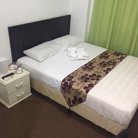 مُوار Hotel Singgah Inn المظهر الخارجي الصورة