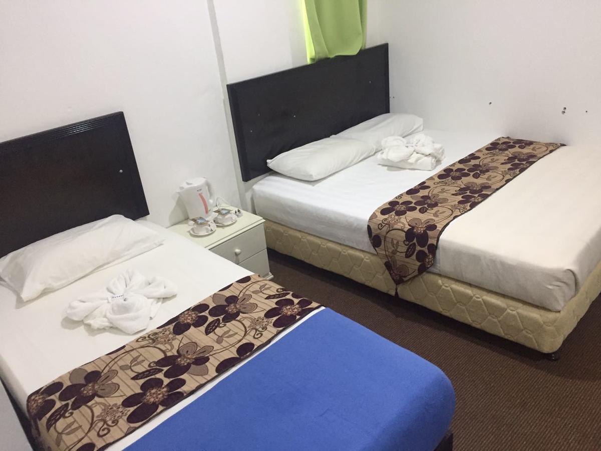 مُوار Hotel Singgah Inn المظهر الخارجي الصورة