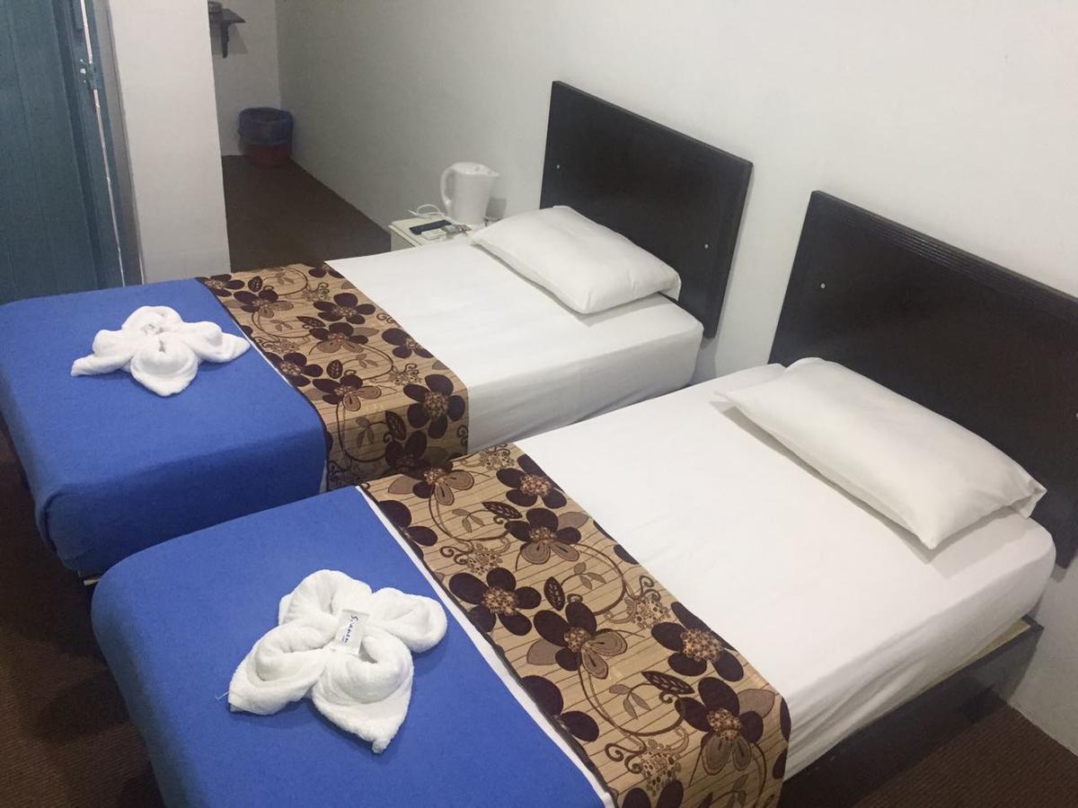 مُوار Hotel Singgah Inn المظهر الخارجي الصورة
